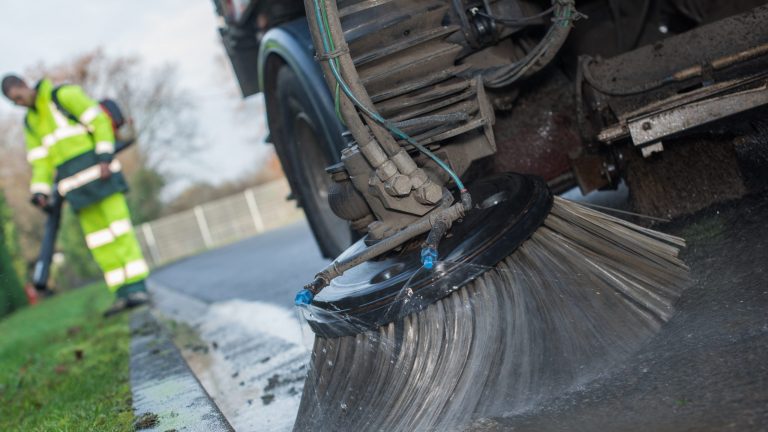 close up from parts of a street cleaning vehicle
